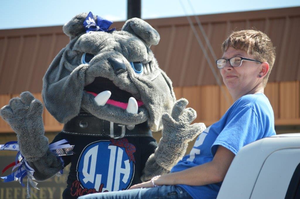 Quitman Junior High mascot Spike (Breanna Bell) is pictured with her mom, Brandi Hood, during Friday’s Quitman homecoming parade.